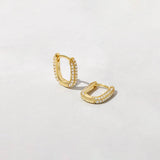 Oval Pavé Huggies
